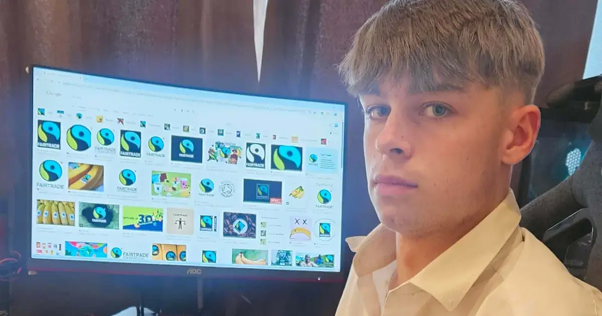 Pocklington School Sixth Former Arthur with Fairtrade logos on computer screenPage Image