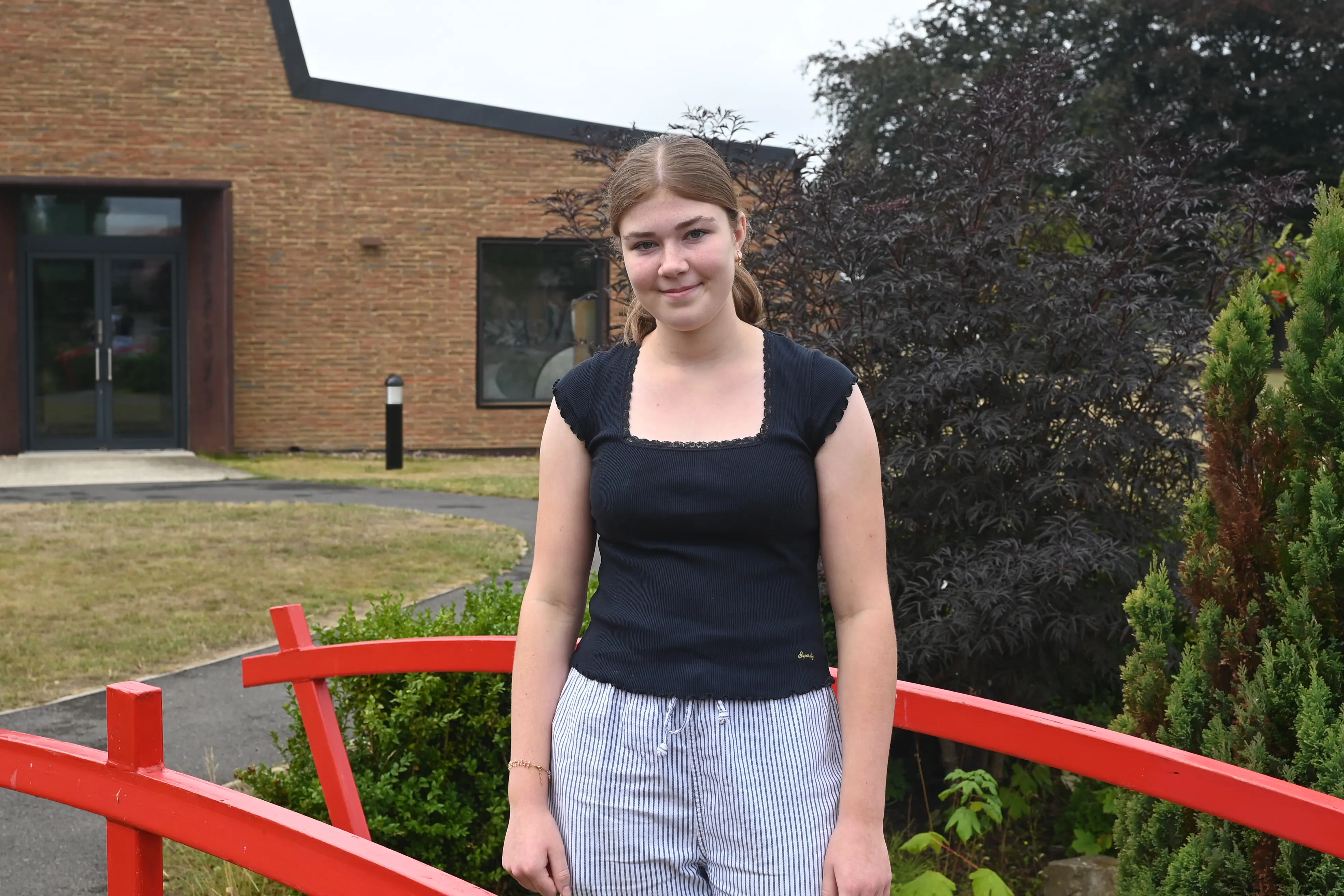 Emily is celebrating a strong set of GCSE results, including a grade 9 in German.