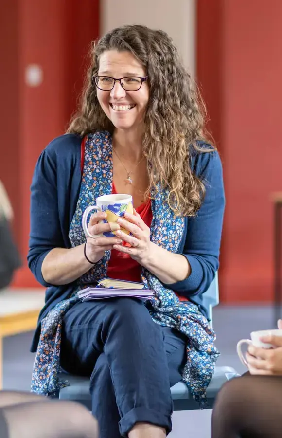 Pocklington School teacher talking to Sixth Formers in Sixth Form cafe area