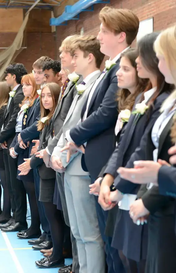 Pocklington School Prefect leavers handing over their gowns at Prizegiving