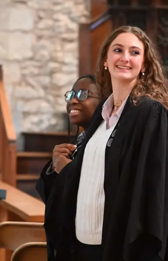 Pocklington School Sixth Form prefects at church smiling