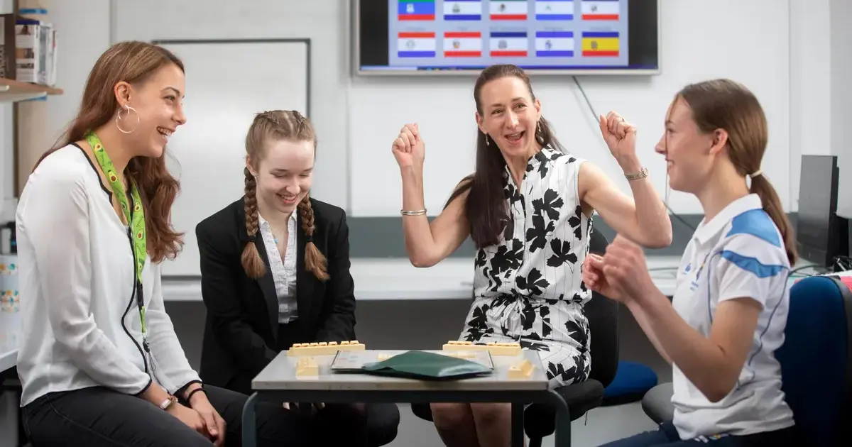 MFL teachers and pupils at Pocklington School playing language scrabblePage Image