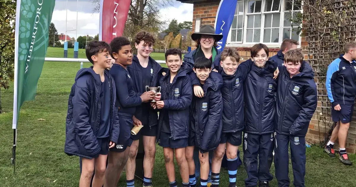 Becky Lovelock Head of Pocklington School with pupils on Community Sports DayPage Image